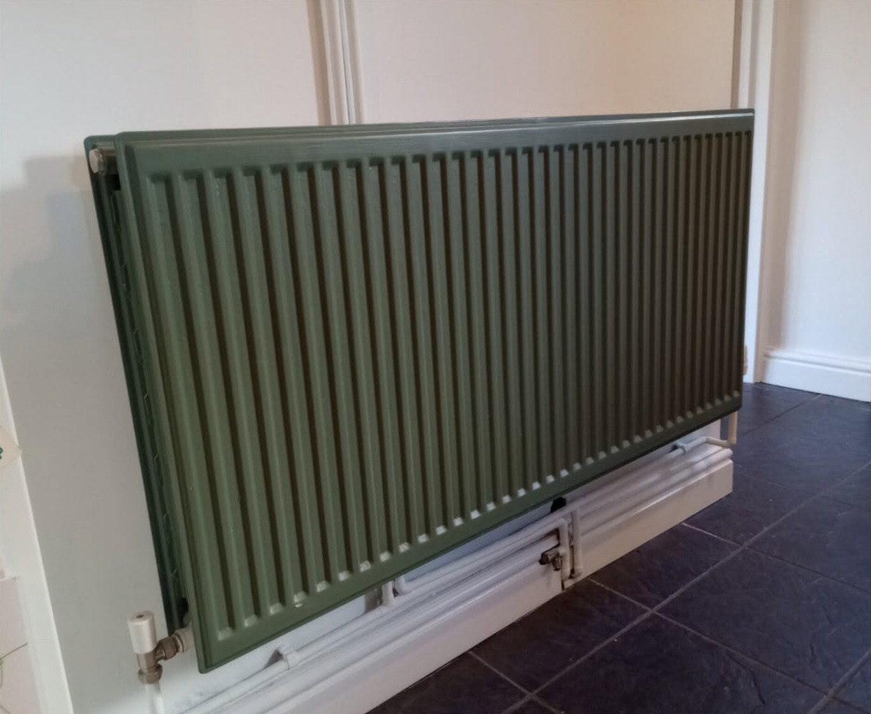 Radiator painted olive green