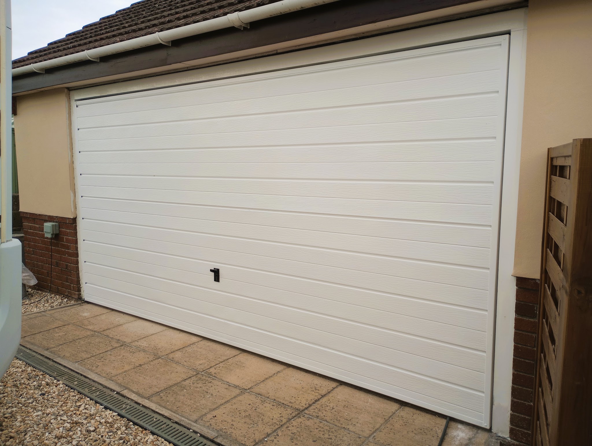 Freshly painted white garage door
